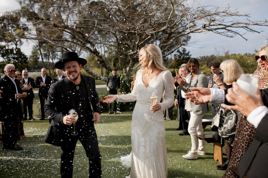 Chloe & Jai wedding ceremony exit at Micalo Estate Yamba